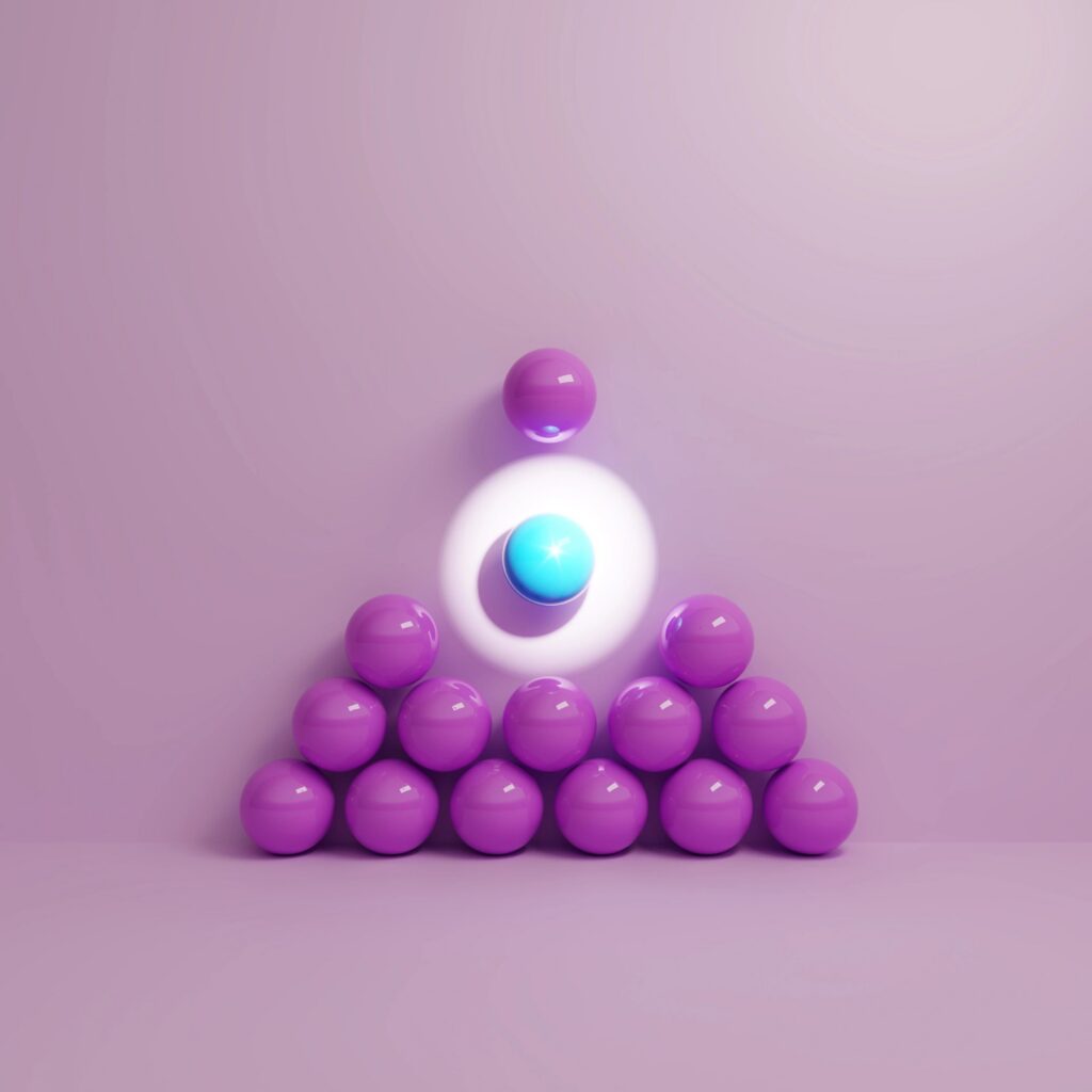 Spotlight on a single sphere standing out from the group